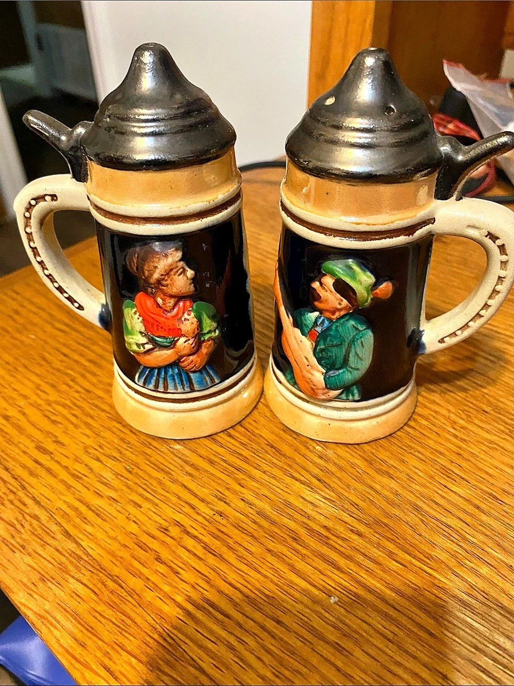 Pair of salt and pepper/Figurative Lidded Beer Steins 4 1/2 inch tall